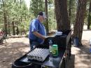 Rick W1GHF prepares breakfast prior to Field Day setup.